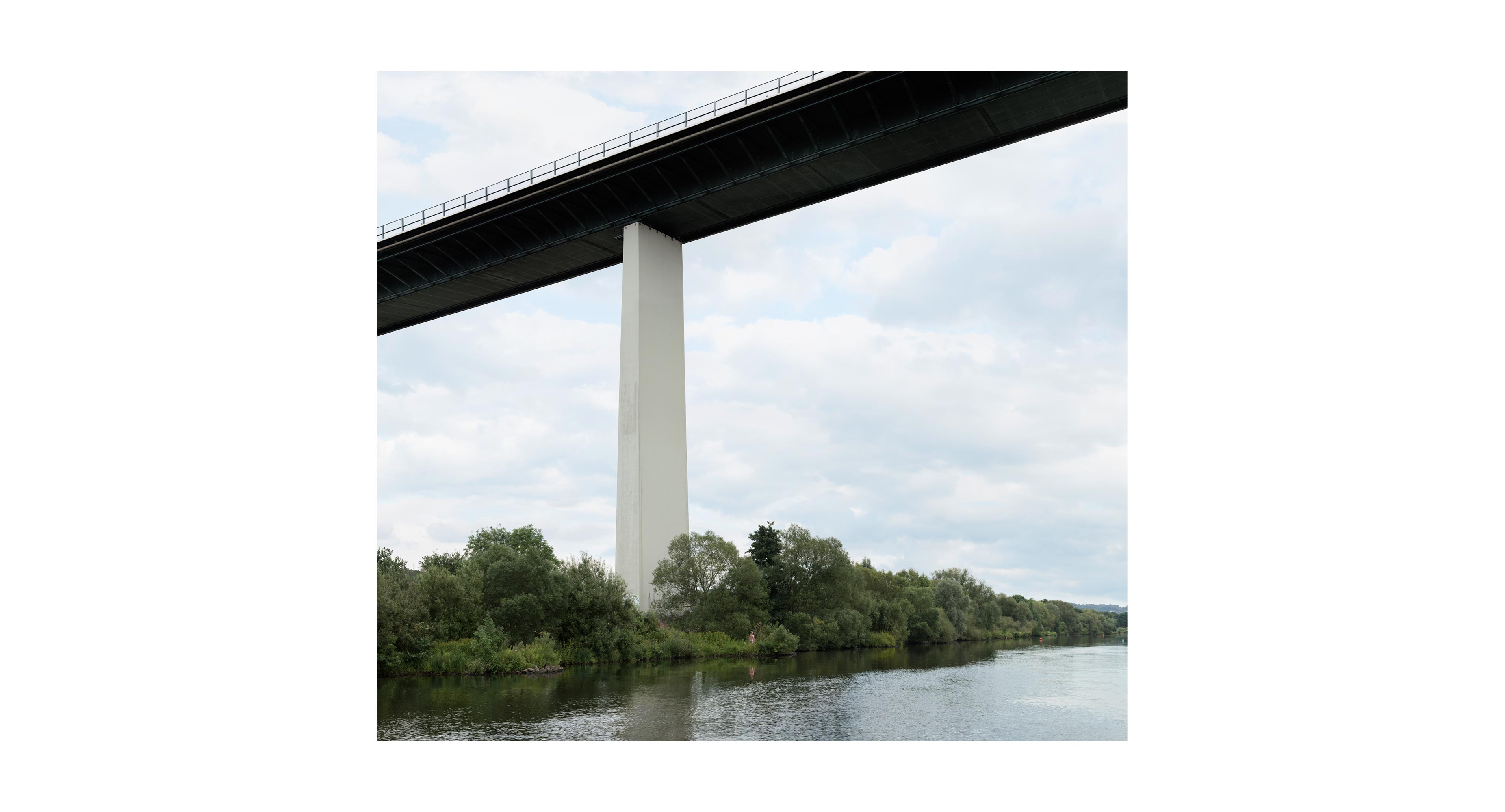 A Person standing at the Ruhrtal Bridge near Essen